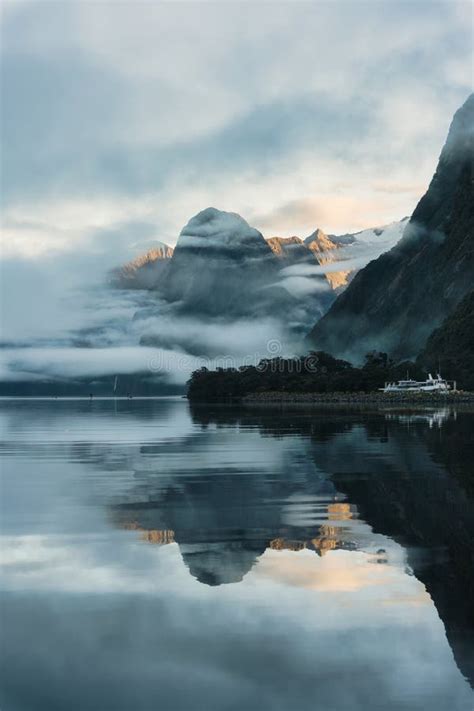 Milford Sound With Waterfall In Foggy On The Lake At Fjordland National