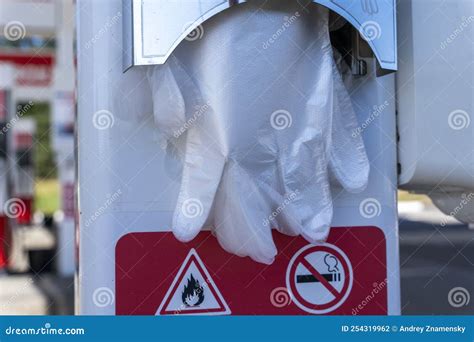 Plastic Fuel Disposable Gloves At A Gas Station Hygiene Measures Stock