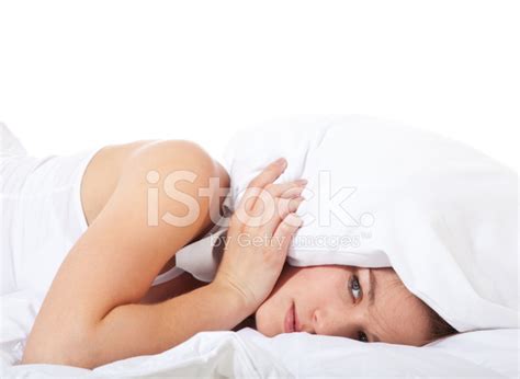 Tired Young Woman In Bed Stock Photo | Royalty-Free | FreeImages