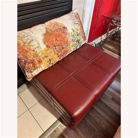 Red Leather Sectional with matching Ottoman - AptDeco