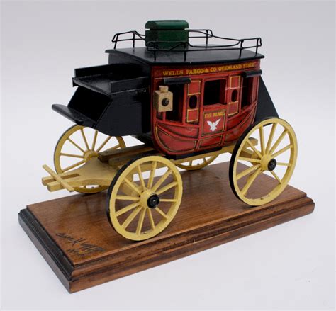 Oscar M. Cortes Wells Fargo Wooden Mounted Stagecoach Model | EBTH