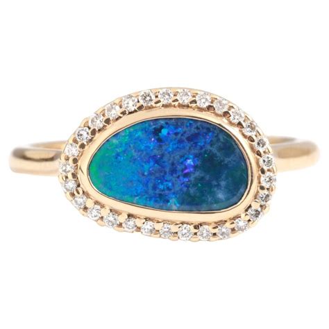 14k Yellow Gold Australian Opal and Diamond Halo Ring For Sale at 1stDibs