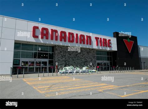 A Logo Sign Outside Of A Canadian Tire Retail Store Location In