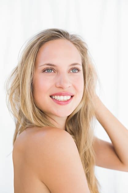 Premium Photo Pretty Blonde Sitting On Massage Table