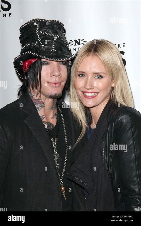 15 February 2011 Hollywood Ca Dj Ashba And Nicky Whelan Arrives To