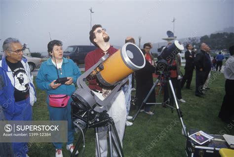 Amateur Astronomers Viewing A Solar Eclipse At Griffith Park