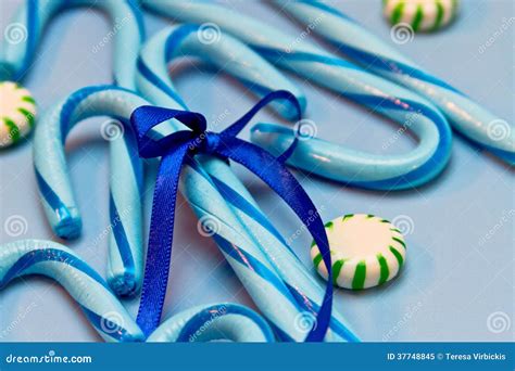 Blue Candy Canes stock image. Image of hard, sweets, ribbon - 37748845