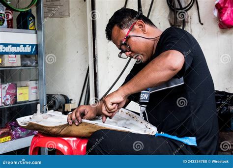 Mechanic Working Under Car Hood In Repair Garage Editorial Photo