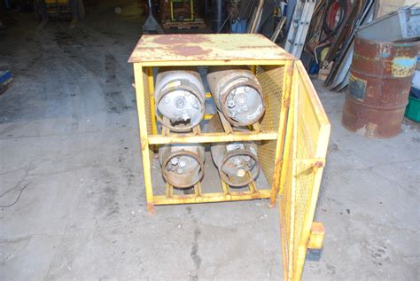 33" x 34" x 39" Propane Tank Storage Cabinet Cage and four 33.5lb tank