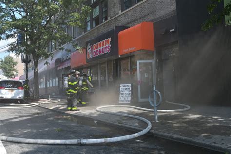 Three Alarm Inferno Hits Queens Shopping Strip Four Firefighters Hurt