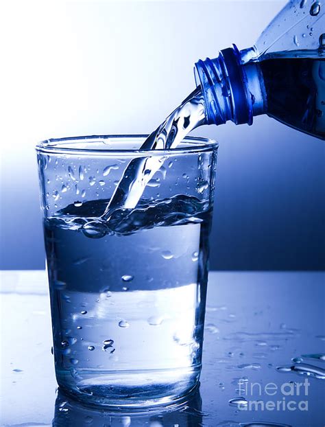 Pouring Fresh Water Into A Glass 1 Photograph By Michal Bednarek Pixels