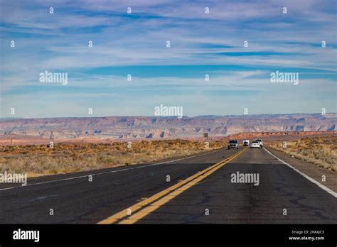 A Picture Of The Us Route 89 In Arizona With The Grand Canyon Landscape In The Distance Stock