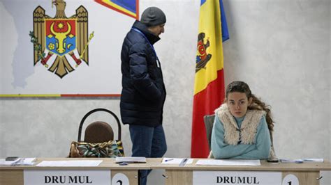 Moldovans Vote In Presidential Runoff Amid Claims Of Russian Interference