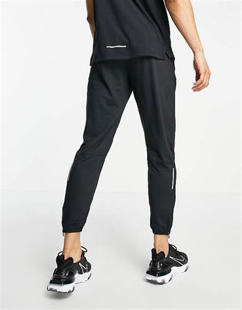 Nike Running Essential Joggers In Black Asos