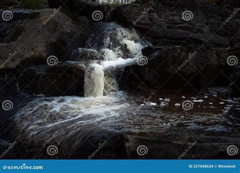 Small Rocky Waterfall with Splashing Water Stream Stock Photo - Image ...