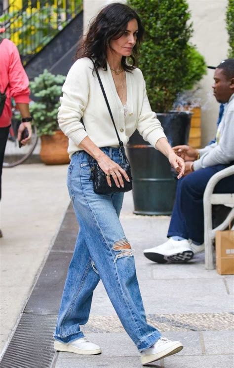 Courteney Cox In A Blue Ripped Jeans Was Seen Out In New York City