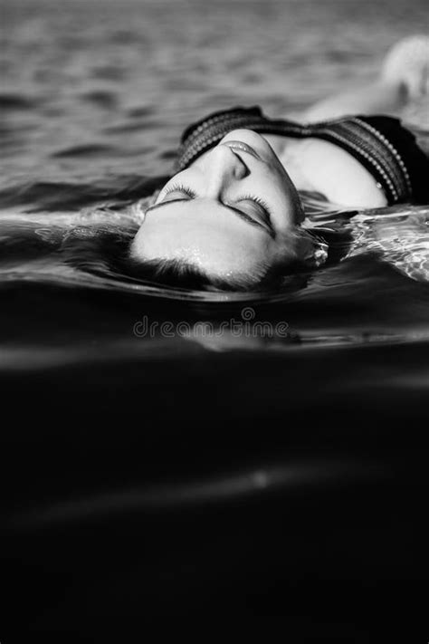 Woman Floating On Water Stock Photo Image Of Tropical 98392490