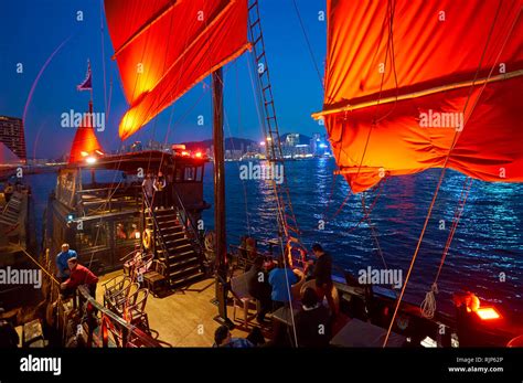 HONG KONG JANUARY 25 2016 The Red Sails Of Aqua Luna At Twilight