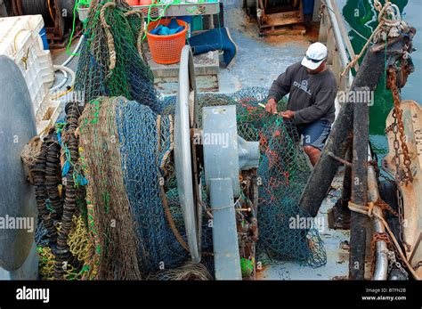 Fisherman Mending Fishing Nets High Resolution Stock Photography And