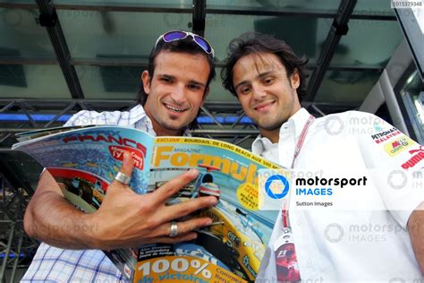 L To R Vitantonio Liuzzi ITA Red Bull Racing And Felipe Massa BRA