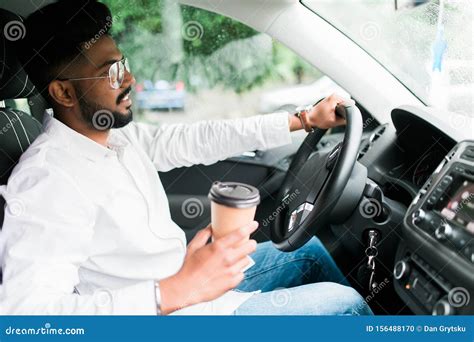 Transportation And Vehicle Concept Young Indian Man Drinking Coffee