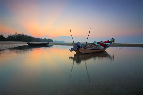 Fishing Boat In Still Water Royalty Free Stock Photo