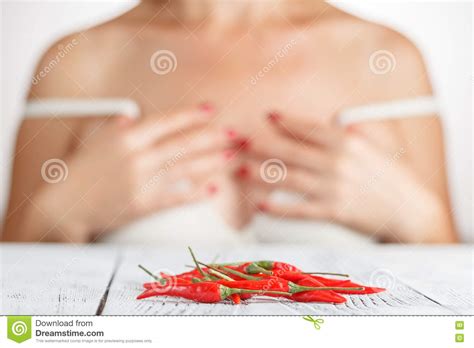 Woman Wearing White Lingerie Holding Hot Chili Stock Photo Image Of Erotic Underwear