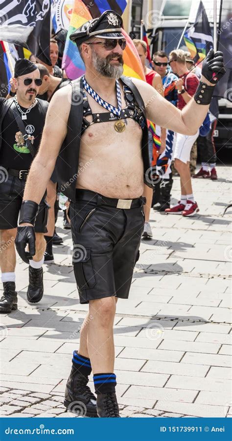 An Almost Naked Gay Man Wearing Leather Harness Attending The Gay Pride