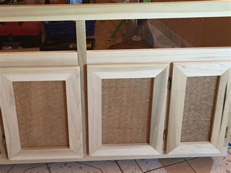 Diy Cabinet Door Used Burlap And Chicken Wire For A More Rustic Look