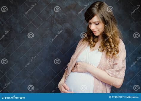 Expectant Mom Touching Her Belly Beautiful Pregnant Young Woman On