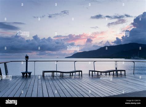 The Esplanade boardwalk at twilight. Cairns, Queensland, Australia ...