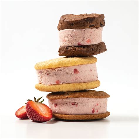 Three Ice Cream Sandwiches With Strawberry Ice Cream And Different