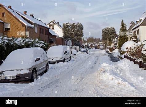 Snow Covered Street Stock Photo Alamy