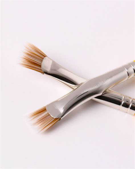 The Bent Angle Of The Brush Allows For A Clean Application While The