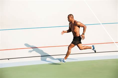 Free Photo Full Length Portrait Of A Strong Half Naked Sportsman Running