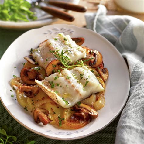 Corvina al horno con patatas y champiñones