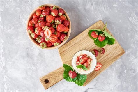 Premium Photo Strawberry Granola Or Smoothie In Glass And Fresh