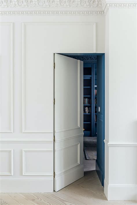 Undercover Architecture - jib door open - hidden doorway | Laurel Home