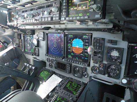 The Cockpit Of An Airplane With Multiple Instruments