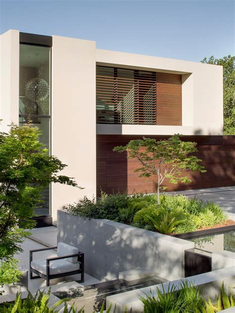 Windows Slice Through The Solid Exterior Of This Modern Home In California