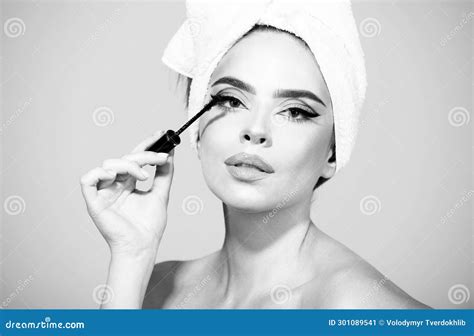 Beauty Makeup Woman With Towel On Head Applying Black Mascara On