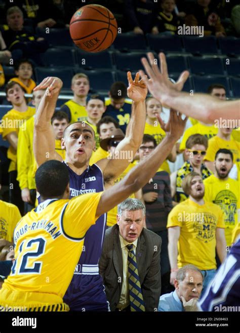 Michigan Guard Muhammad Ali Abdur Rahkman Defends A Pass From