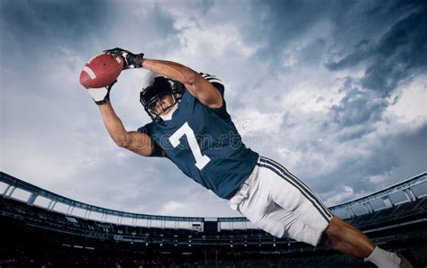 American Football Player Catching A Touchdown Pass Stock Image Image Of Diving Amazing 42696635