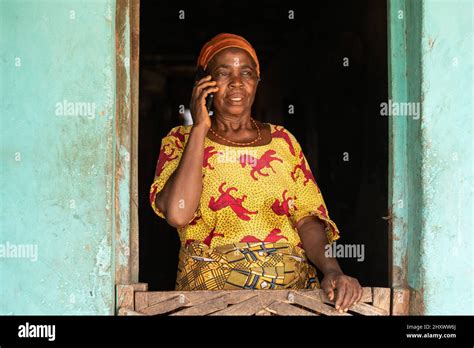 A Smiling Elderly African Woman Making A Phone Call Stock Photo Alamy