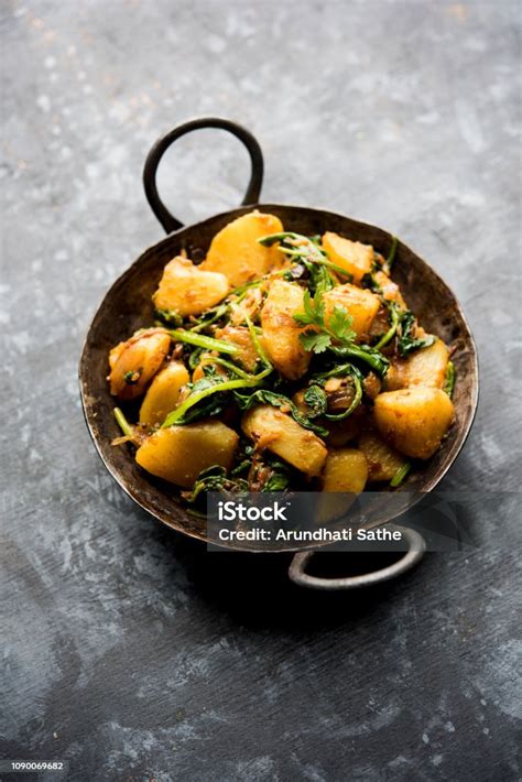 aloo palak sabzi potato cooked  spinach  added spices  healthy