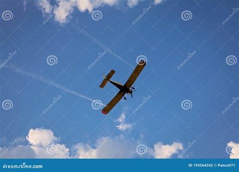 Airplane Flying Above Clouds at Sunset Stock Photo - Image of clouds, wing: 193564242