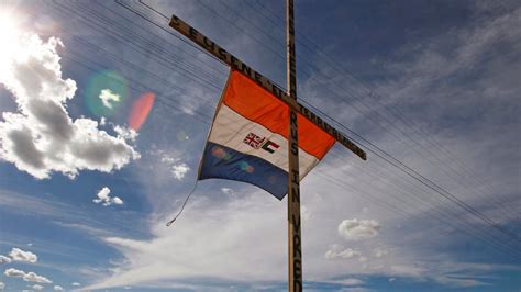 White farmers fly Apartheid-era South African flag flown at march ...