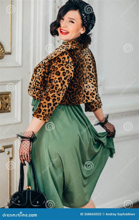 Beautiful And Playful Brunette In Retro Clothes Gloves Beret And With
