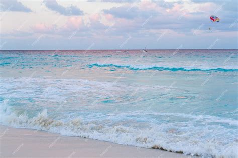 Premium Photo | Sunset over the beach on caribbean sea.