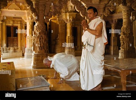 Jain Devotees Do Their Prayers Inside A Jain Temple In The Jaisalmer